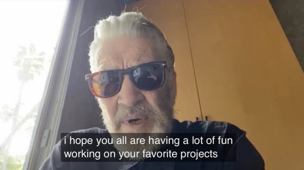 David Lynch in sunglasses with a beard captioned 'i hope you all are having a lot of fun working on your favorite projects'