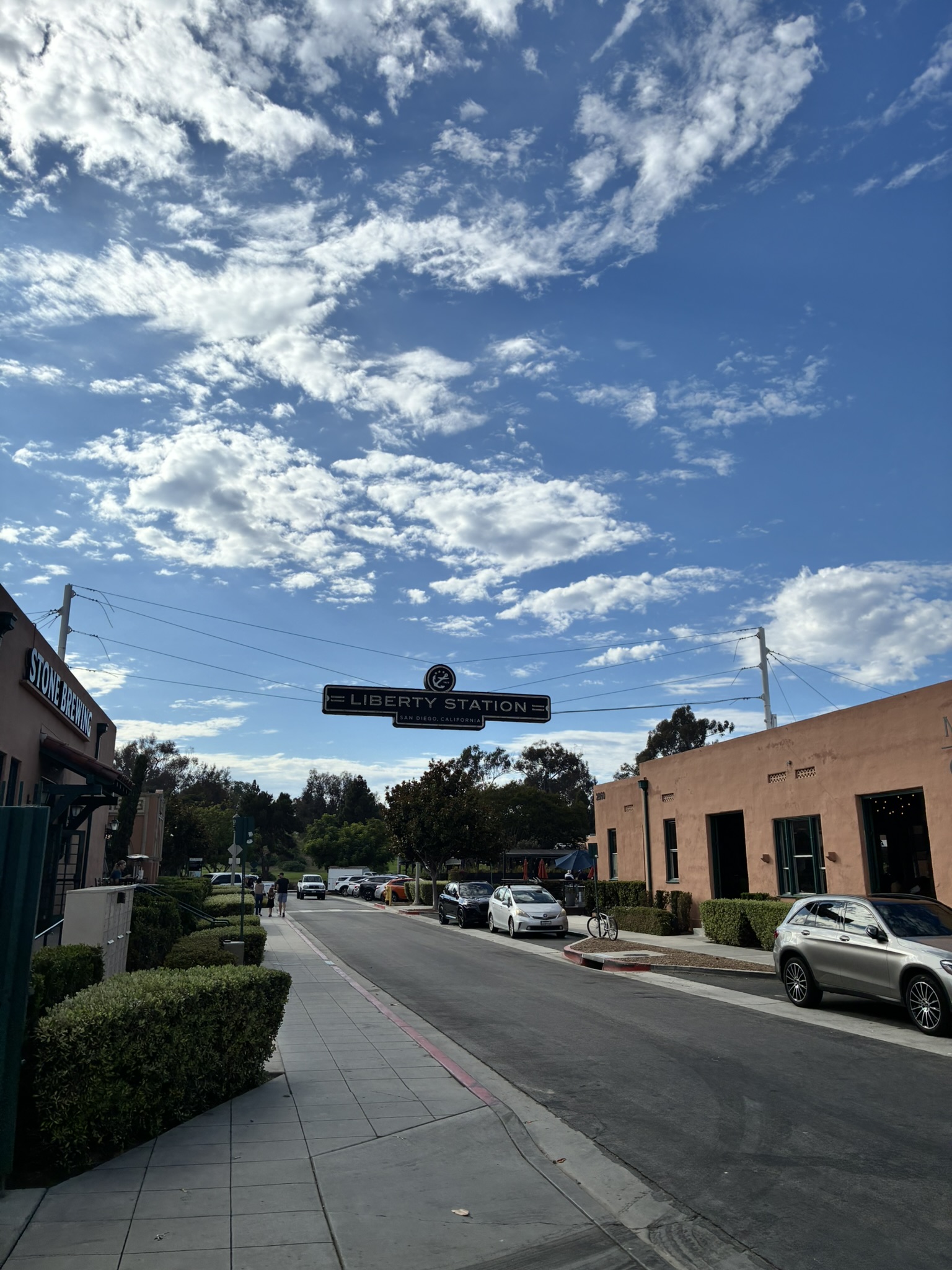 A 'Liberty Station, San Diego California' sign against a blue sky